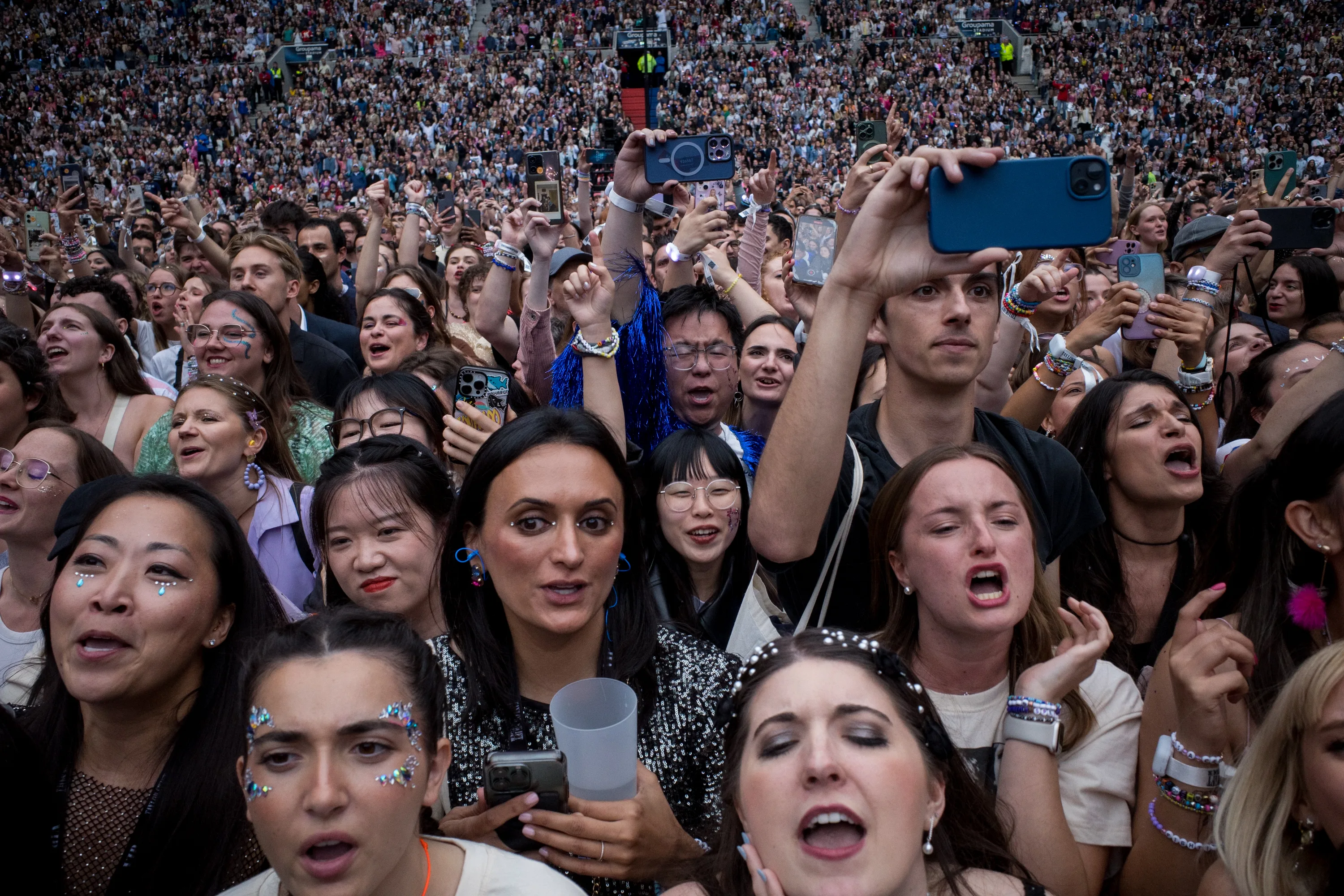 A dense concert crowd, faces caught between joy and noise &mdash; GR Photo Festival 2024 winner by Dan Umareta